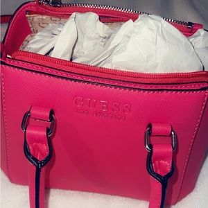 Brand new pink Guess purse.
